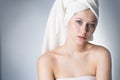 Face of a beautiful young woman with a towel Royalty Free Stock Photo