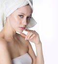 Face of a beautiful young woman with a towel Royalty Free Stock Photo