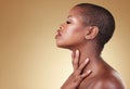 Face, beauty and makeup of a black woman in studio for self care, skin glow or cosmetics. Profile of African aesthetic