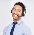 Face, call center and Asian man with headphones for telemarketing, crm support and isolated on a white studio background Royalty Free Stock Photo