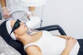 Face Care. Facial Laser Hair Removal. Beautician Giving Laser Epilation Treatment To Young Woman`s Face At Beauty Clinic. Body Ca Royalty Free Stock Photo