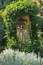 Face carved in a tree stump in Luisenpark