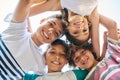 Face, children and family circle or a group of happy siblings together or huddled in solidarity and smiling outdoors Royalty Free Stock Photo