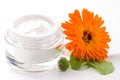 Face cream and calendula flower Royalty Free Stock Photo