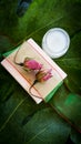 Face cream and rose scented soap for spa treatment