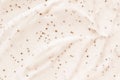 Face cream scrub texture background. Exfoliating skin care product swatch