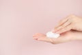 Face foam, facewash mousse in a woman`s hand, beauty skincare cosmetic Royalty Free Stock Photo