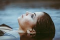 face girl lying in the water Royalty Free Stock Photo