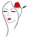 Face of a girl with a red rose in her hair. Royalty Free Stock Photo