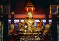 Face of golden Buddha, golden image of Buddha inside the temple Royalty Free Stock Photo