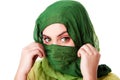 Face with green eyes and scarf Royalty Free Stock Photo