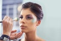 Face, hands and woman, makeup artist for beauty with brush for color powder and glamour with beautician. Eyeshadow Royalty Free Stock Photo