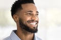 Face of happy attractive young African American man looking away Royalty Free Stock Photo