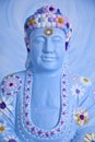 Face of happy buddah in blue with colorful decoration Royalty Free Stock Photo