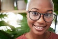 Face, headshot and black woman in glasses and eye care, optometry with frame and prescription lens for vision. Eyesight Royalty Free Stock Photo