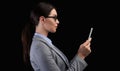 Businesswoman Using Smartphone Face Recognition System On Black Background Royalty Free Stock Photo