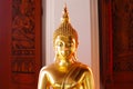 Face image of Golden Buddha statue at Thai temple Royalty Free Stock Photo