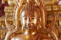 Face image of Golden Buddha statue at Thai temple Royalty Free Stock Photo