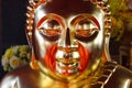 Face image of Golden Buddha statue at Thai temple Royalty Free Stock Photo