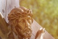 The face of Jesus Christ, the Son of God. A crown of thorns on his head. Sunbeams Royalty Free Stock Photo