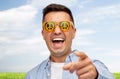 Face of laughing man in green peace sunglasses Royalty Free Stock Photo