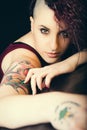 Face makeup and tattoos, punk girl make-up. Hair shaved