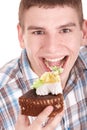 Face of man eating cake. Royalty Free Stock Photo
