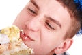 Face of man eating cake. Royalty Free Stock Photo