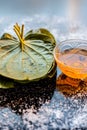 Face mask for controlling oiliness consisting of betel leaves, honey, sea-salt on a black wooden surface. Royalty Free Stock Photo