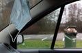 face mask inside the car. hanging on the rearview mirror Royalty Free Stock Photo