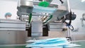 Face mask production line in modern factory Royalty Free Stock Photo