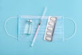 Face mask, vial, syringe Royalty Free Stock Photo