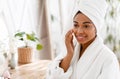 Face Massage. Beautiful African American Girl Touching Her Soft Skin After Bath Royalty Free Stock Photo