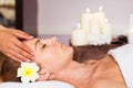 Face Massage. Close-up of a beautiful Woman Getting Spa Treatment. Royalty Free Stock Photo