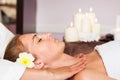 Face Massage. Close-up of a beautiful Woman Getting Spa Treatment. Royalty Free Stock Photo