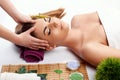 Face massage. Close-up of young woman getting spa massage treatment at beauty spa salon.Spa skin and body care of female Royalty Free Stock Photo