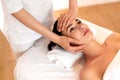Face Massage. Close-up of a Young Woman Getting Spa Treatment. Royalty Free Stock Photo