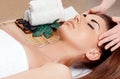 Face massage. people, beauty, spa, healthy lifestyle and relaxation concept - close up of beautiful young woman Royalty Free Stock Photo