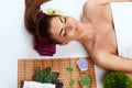 Face massage. people, beauty, spa, healthy lifestyle and relaxation concept - close up of beautiful young woman lying with closed Royalty Free Stock Photo