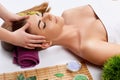 Face massage. people, beauty, spa, healthy lifestyle and relaxation concept Royalty Free Stock Photo