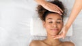 Face massage. Young woman getting spa treatment Royalty Free Stock Photo