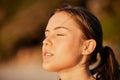 Face, meditation and peace with woman outdoor in nature, standing alone for zen, calm or serenity. Relax, wellness and