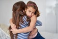 Face, mother and sad girl hug for support in home for care, safety and bonding together with empathy. Depressed, love