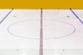 Face off blue spot with red line on hockey rink Royalty Free Stock Photo