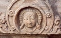 Face of one of the Hindu gods of temple, India. Example of Indian architecture in Pattadakal, UNESCO World Heritage site