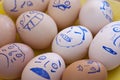 Face painted eggs in a dish Royalty Free Stock Photo