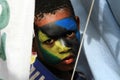 Face painting to local kids in Zanzibar