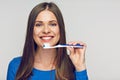 Face portrait of woman smiling with teeth holding toothy brush. Royalty Free Stock Photo