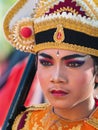 Face portrait of young Balinese dancer in ritual costume