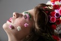 Face in profile of a girl close-up in floral makeup. Royalty Free Stock Photo